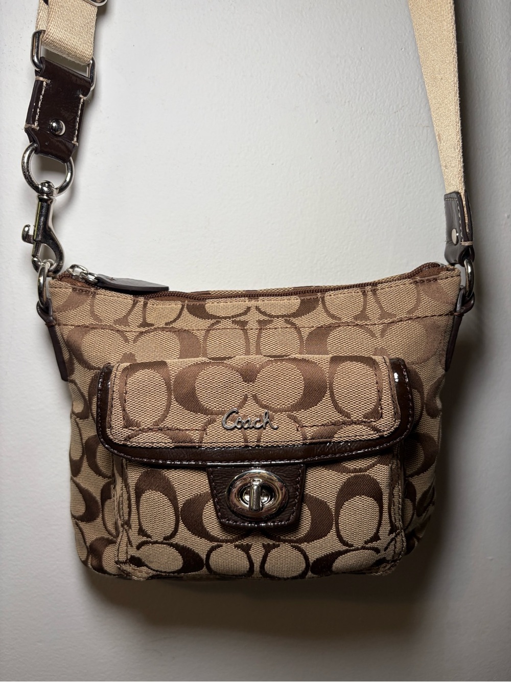 Coach Penelope Signature Canvas Swingpack Crossbody Bag